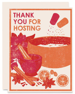 Greeting card with a teapot, cinnamon sticks, and oranges on a beige background