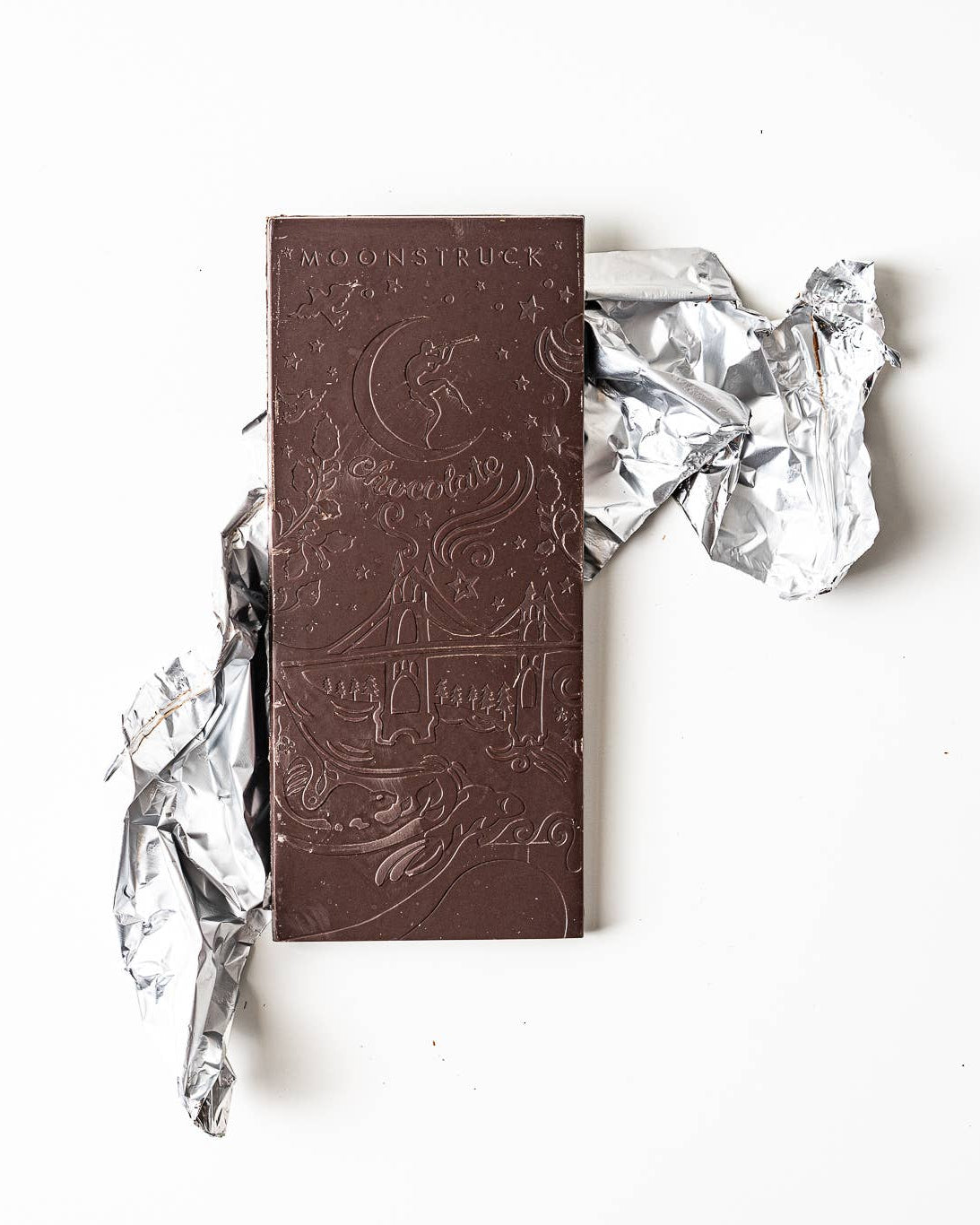 Chocolate bar with packaging on a white background