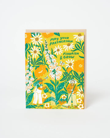 Card with illustration of a couple farming and the words "May your partnership flourish and grow"