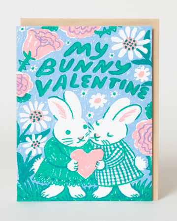 Greeting card with two bunnies holding a heart and 'My Bunny Valentine' text on a floral background.