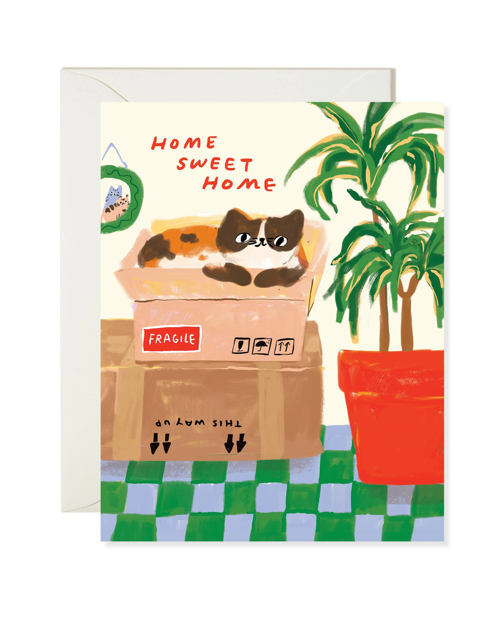 Greeting card with a cat in a box and 'Home Sweet Home' text, featuring a plant and checkered floor.