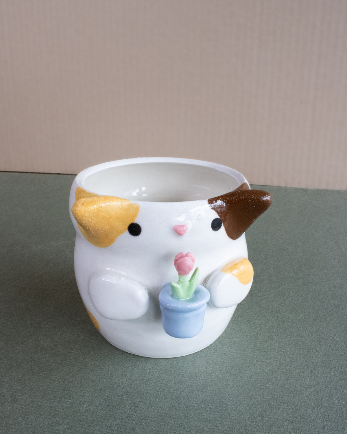 Cat Planter Holding Tulip