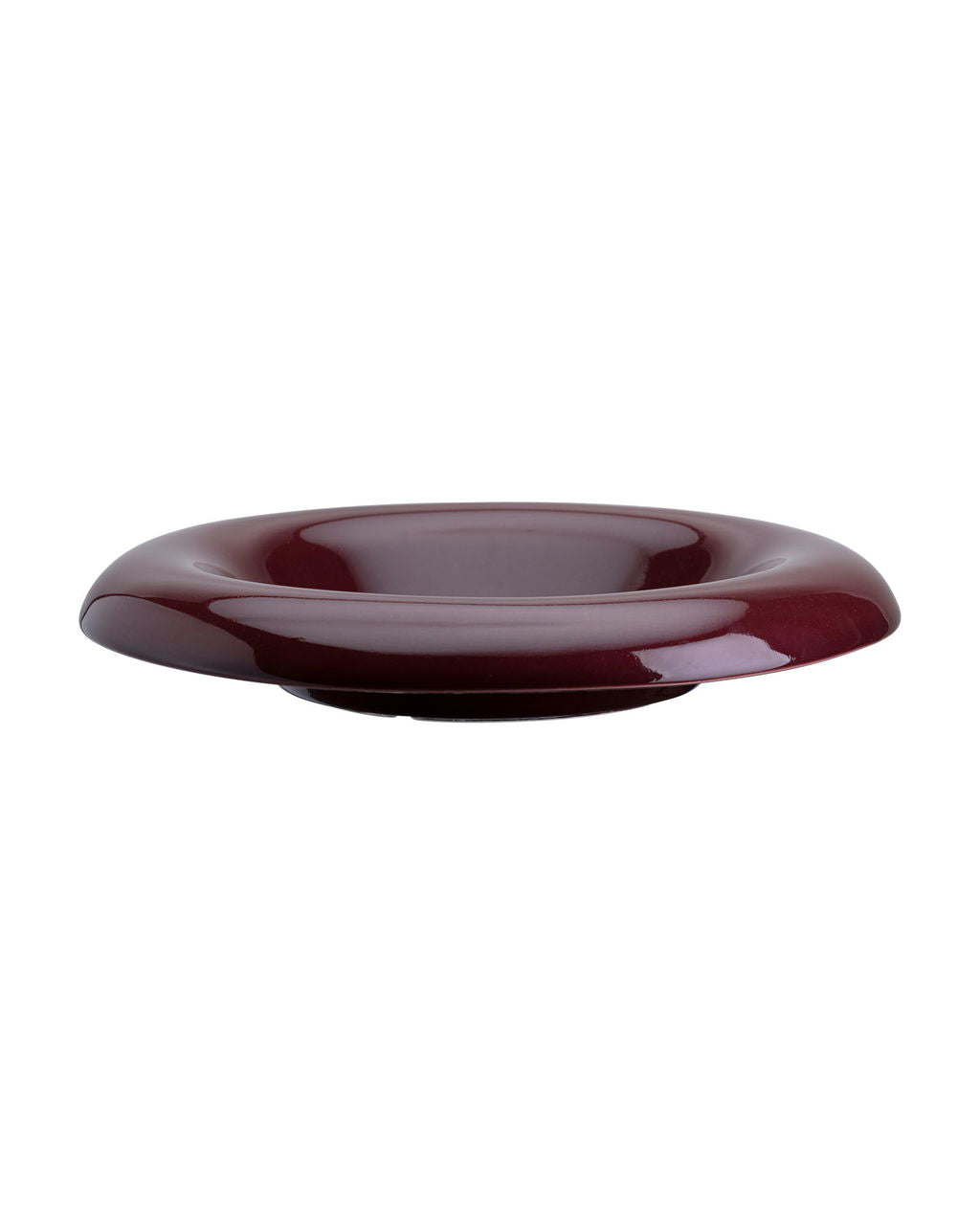 Red ceramic saucer on a white background