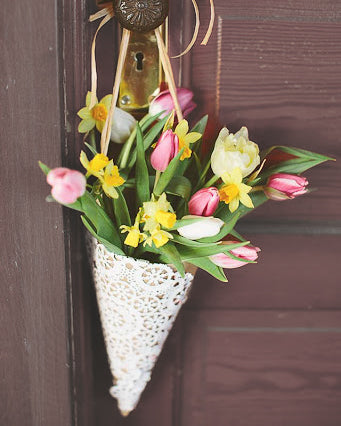 paper cone with flowers hanging from door knob