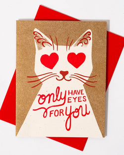 Card with a cat illustration and text 'only have eyes for you' on a red envelope.